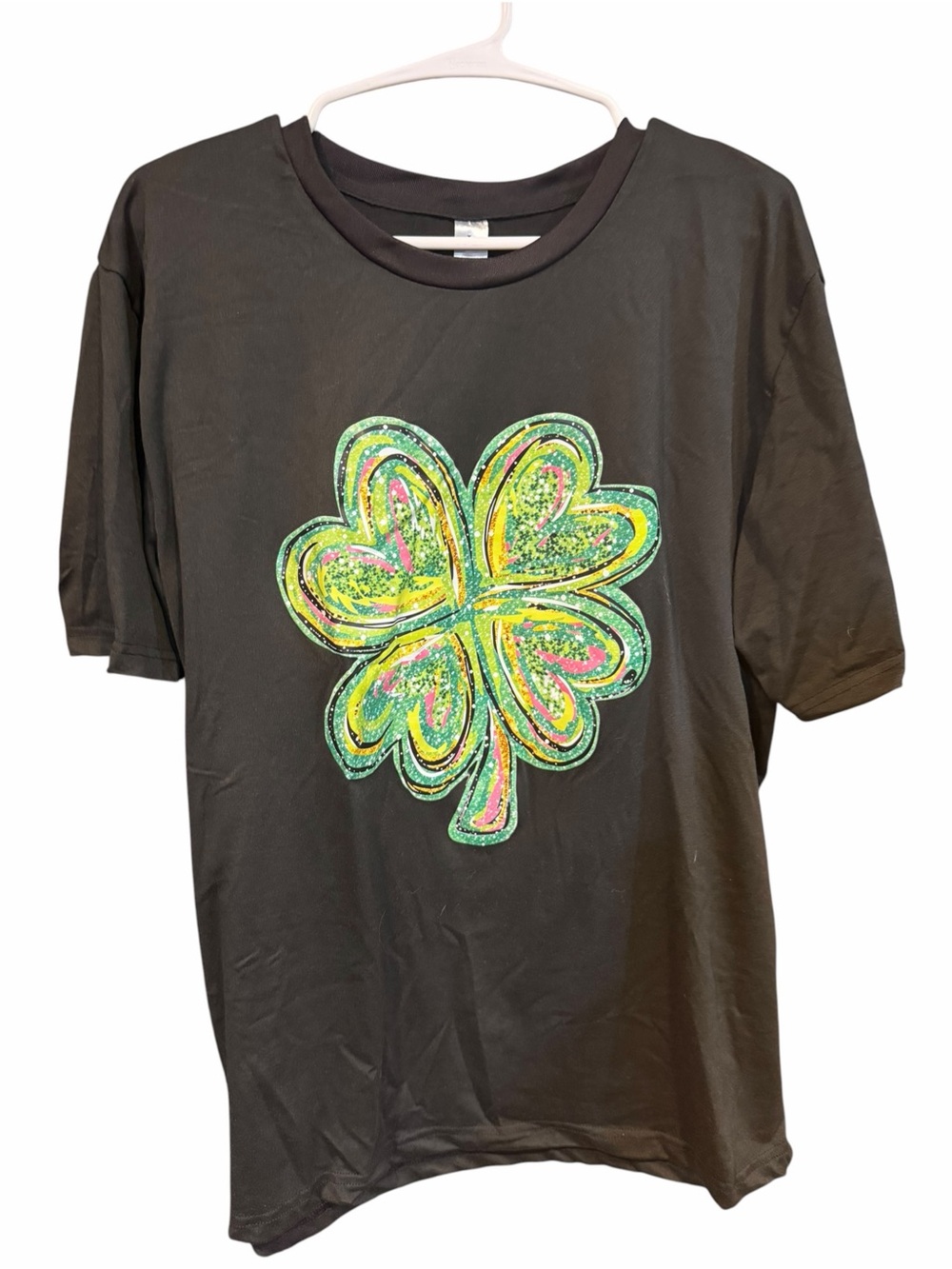 Black Short-Sleeve Tee with Neon Green Shamrock Graphic